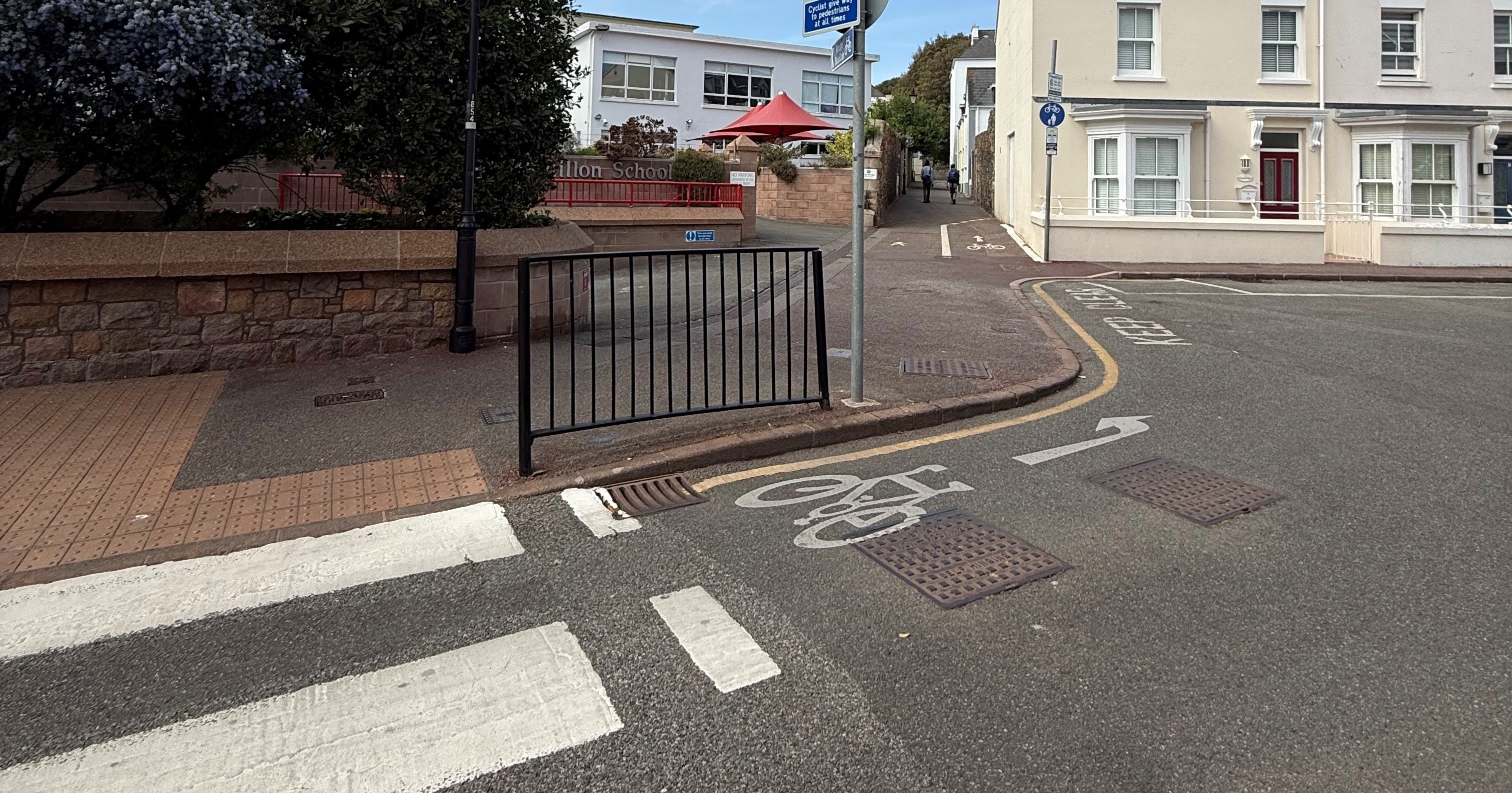 Zebra crossing on approach to Rouge Bouillon school.