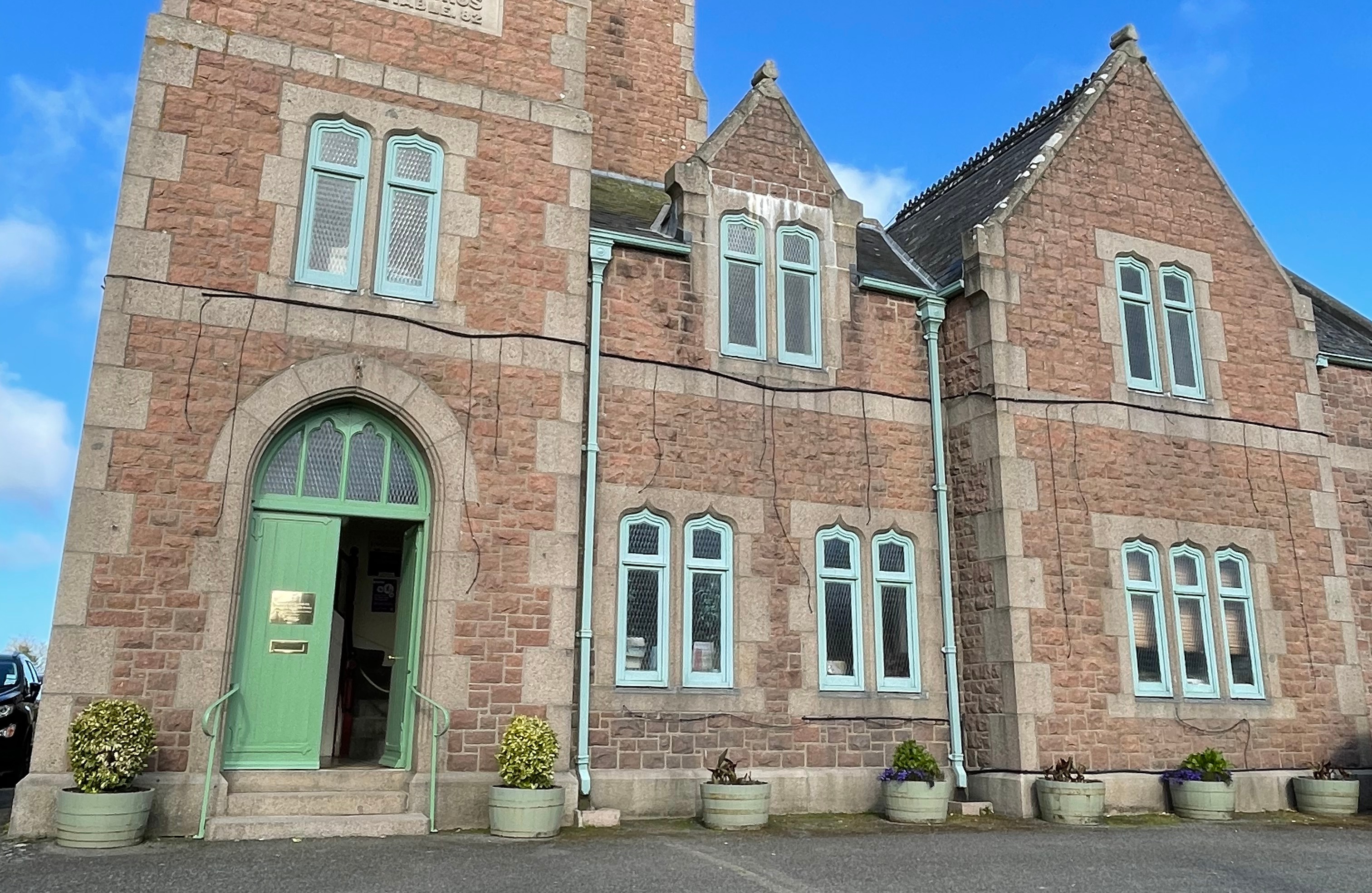 Front view of St. Lawrence Parish Hall and entrance door.