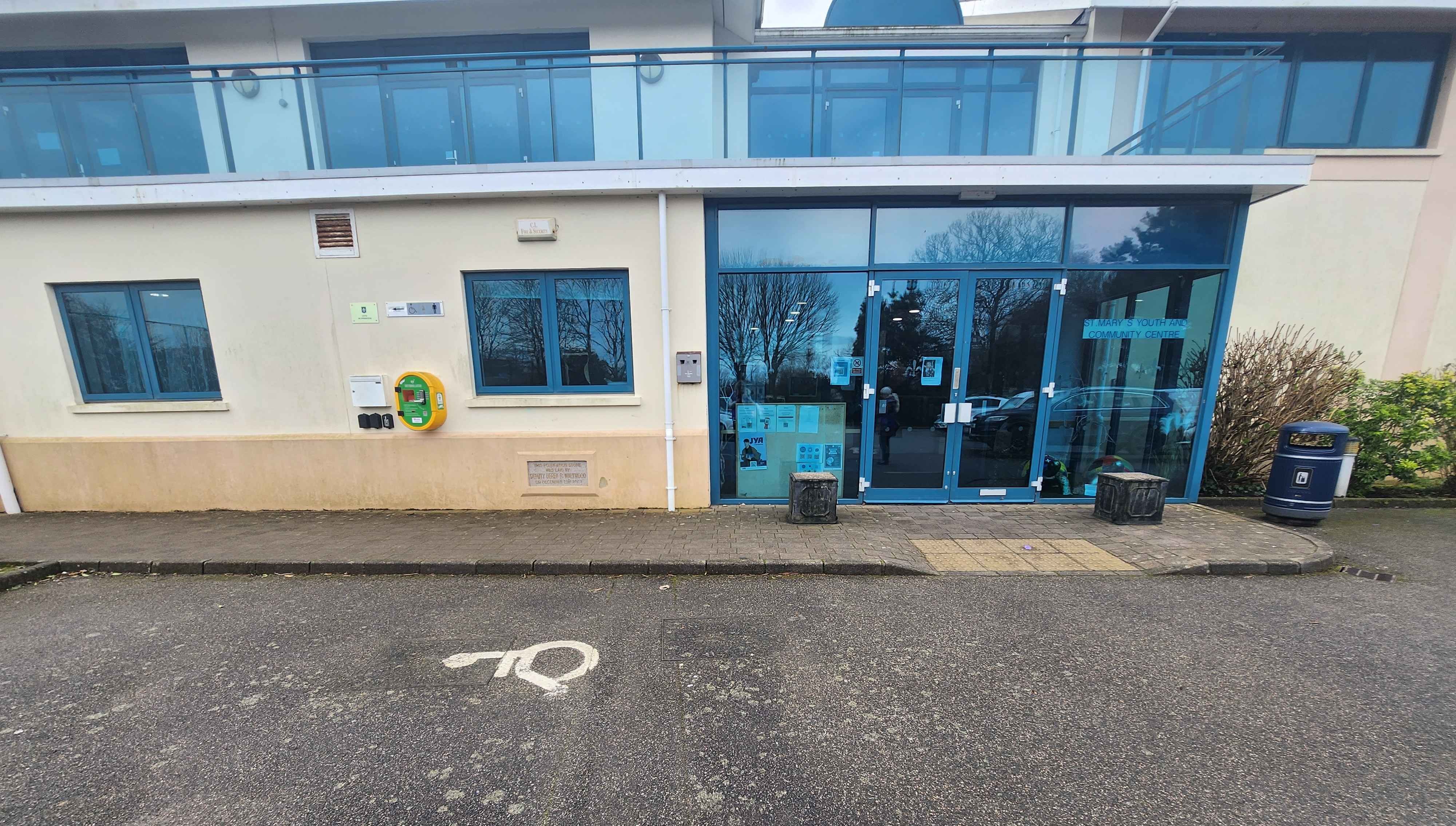 Blue entrance doors to St Mary Youth and Community Centre.