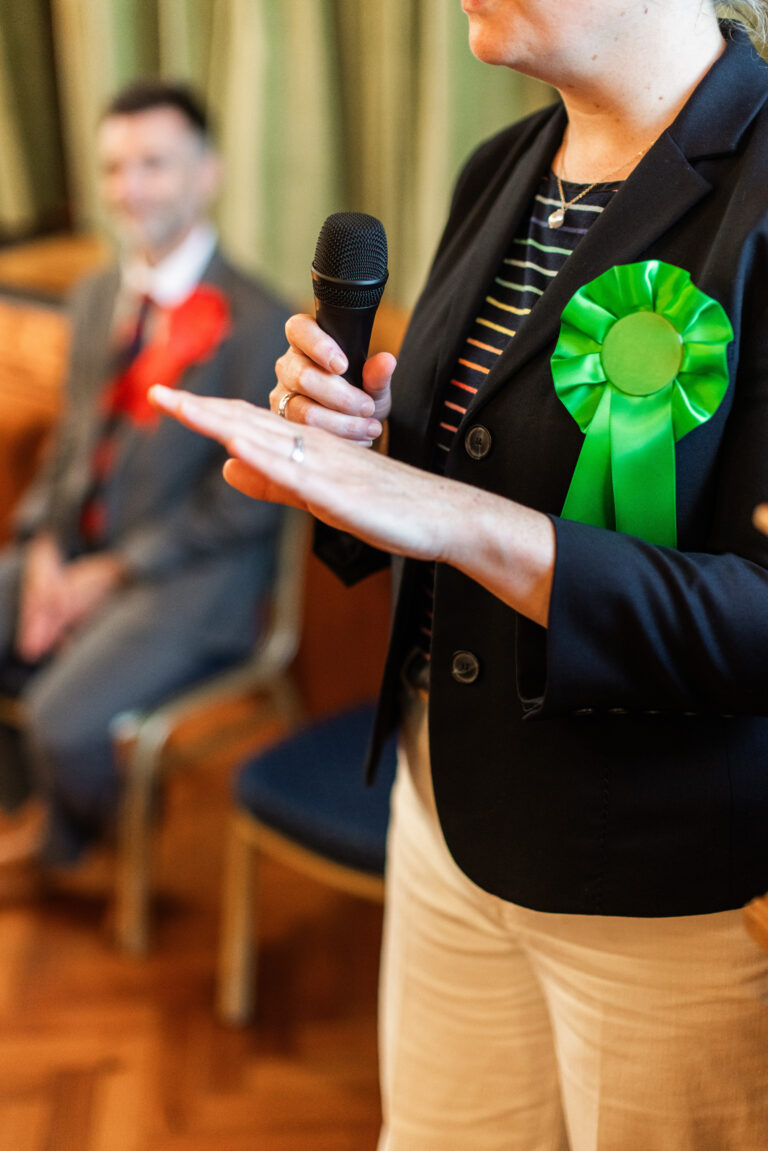 Candidate during a hustings speaking to the public