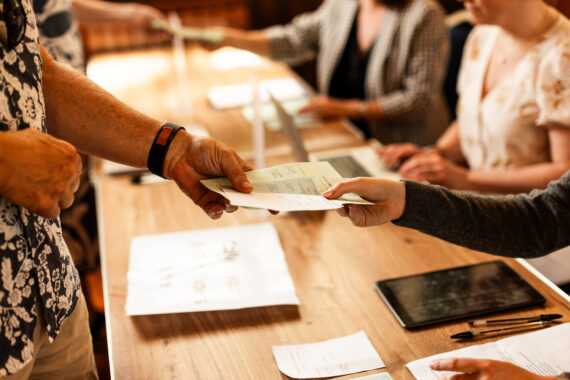 Voter casting ballot