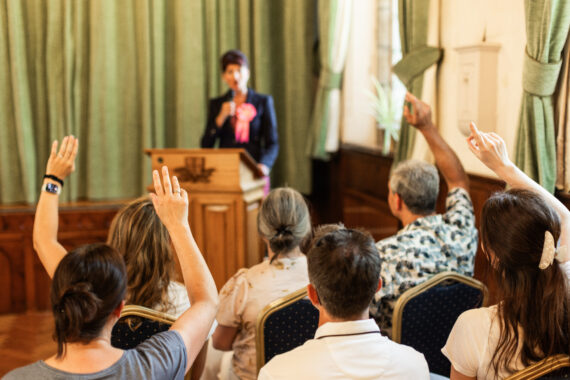 Candidate during a hustings speaking to the public