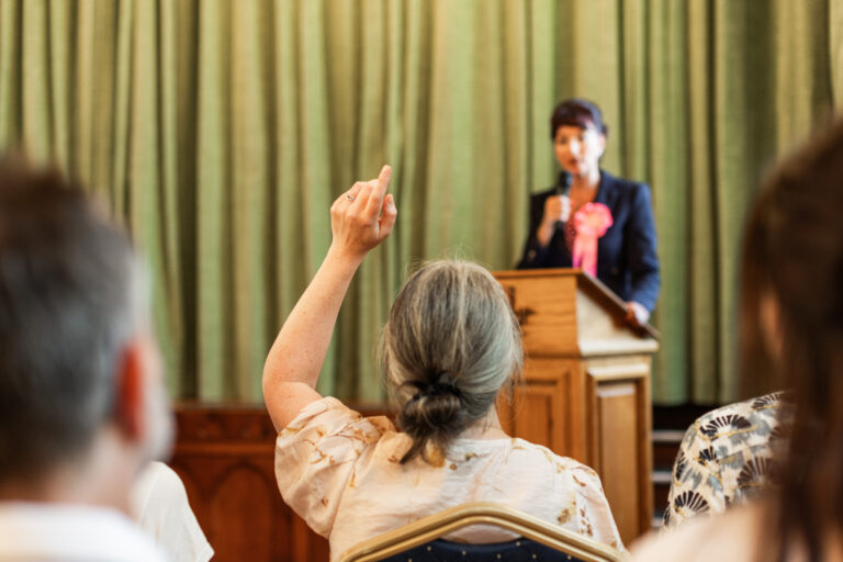 Candidate during a hustings speaking to the public