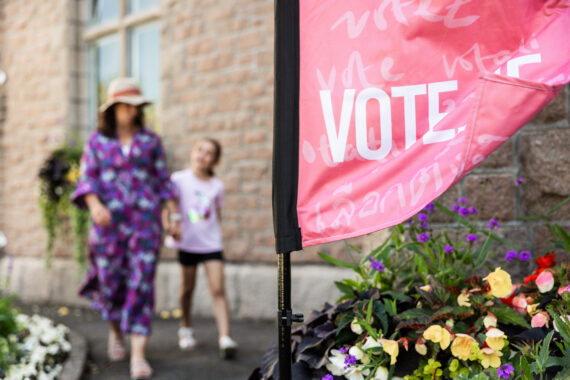 Members of the public entering polling station
