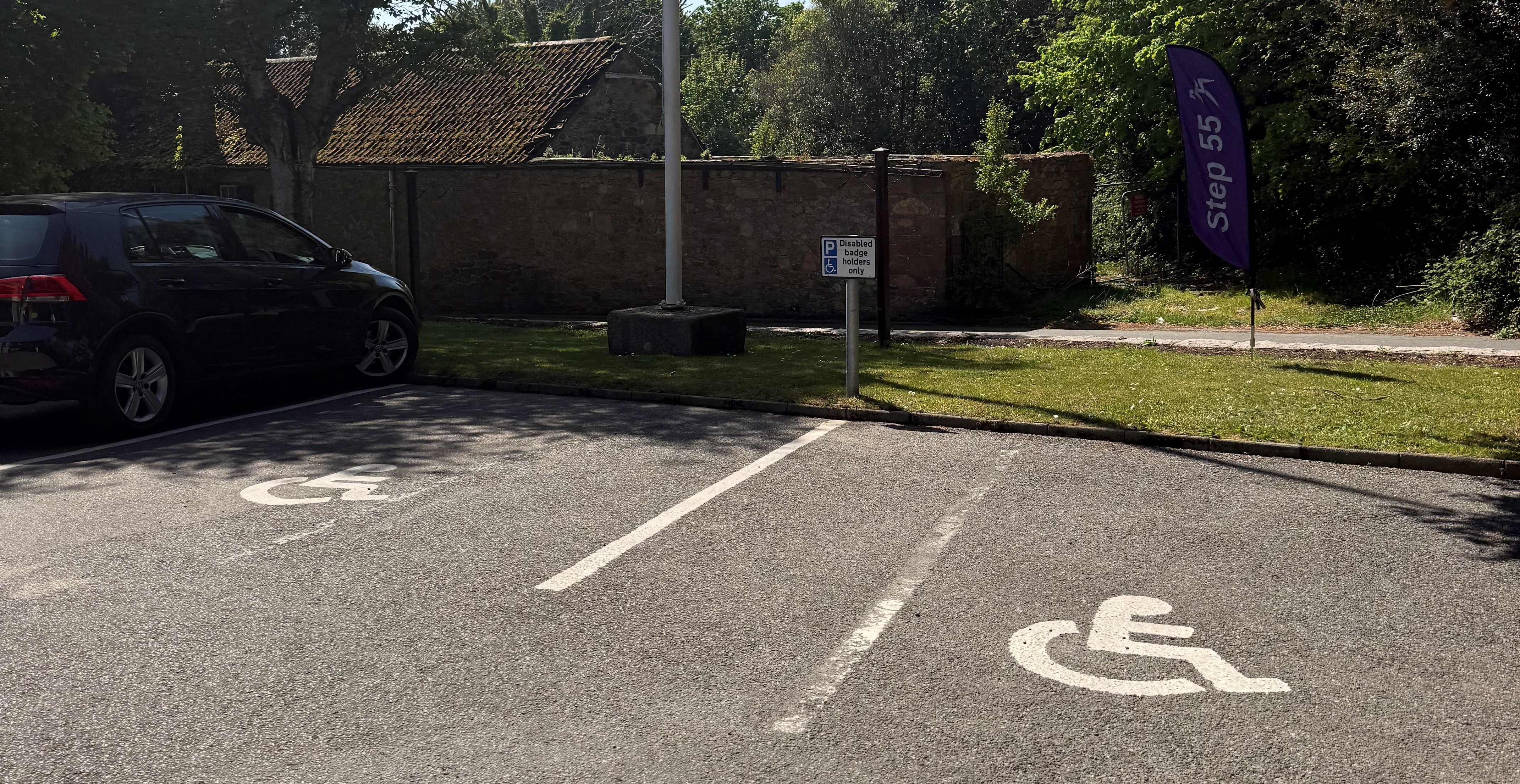 Two empty disabled parking spaces